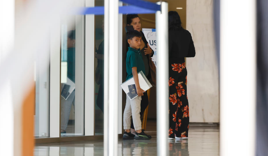 Signing legal guardianship papers for children potentially separated by deportation